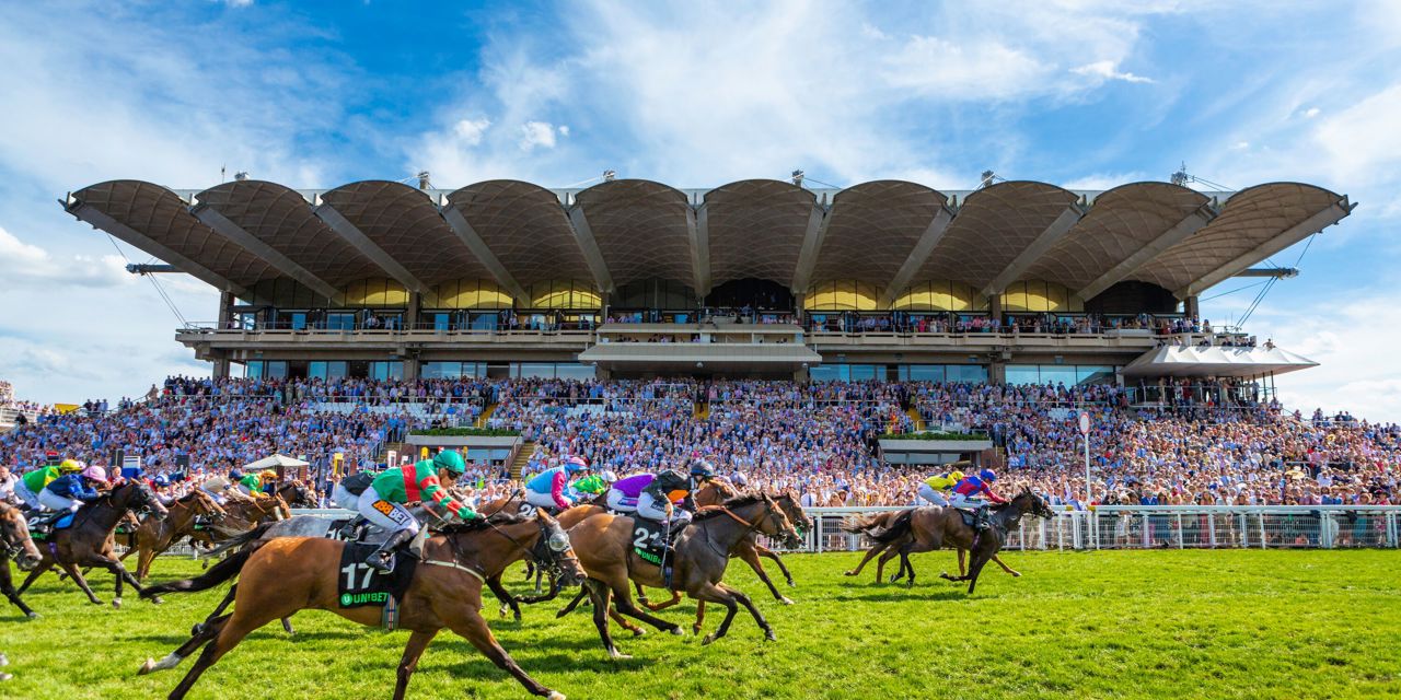 Jason Watson and Gifted Master (maroon and red) win the Unibet Stewards' Cup Handicap Stakes on the fifth and final day of the Qatar Goodwood Festival 2018, QGF..Picture date: Saturday August 4, 2018..Photograph by Christopher Ison ©.07544044177.chris@christopherison.com.www.christopherison.com