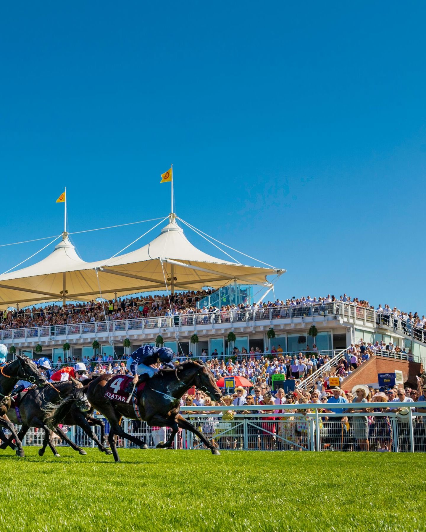 Ryan Moore on Land Force (4) winning the Qatar Richmond Stakes on Ladies' Day on the third day of the Qatar Goodwood Festival 2018 (QGF)..Picture date: Thursday August 2, 2018..Photograph by Christopher Ison ©.07544044177.chris@christopherison.com.www.christopherison.com