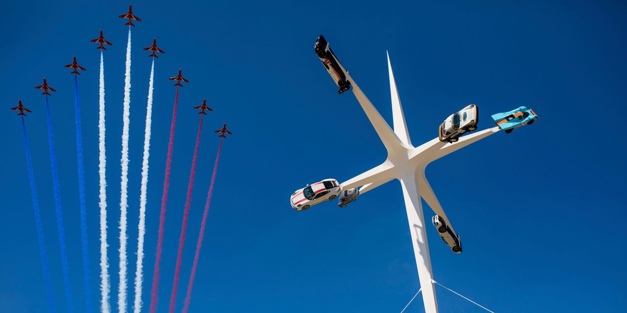 The Red Arrows performing at the 2018 Goodwood Festival of Speed in West Sussex 15/07/2018. The Royal Air Force Aerobatic Team flew directly above the Central Feature, the ultimate expression of design, engineering and speed and epitomises both the event and its celebrated marque, Porsche. The creation of British artist and designer Gerry Judah, who has been masterminding the Central Features at the Festival of Speed for 21 years, the sculpture stands impressively in front of Goodwood House and at 52m high, towers above the entire event..For all editorial enquiries, please contact Laura Gilbert-Burke at the Goodwood Motor Sport Press Office 01243 755000 or Alex Benwell: 07976 236469..Please credit: Nicole Hains