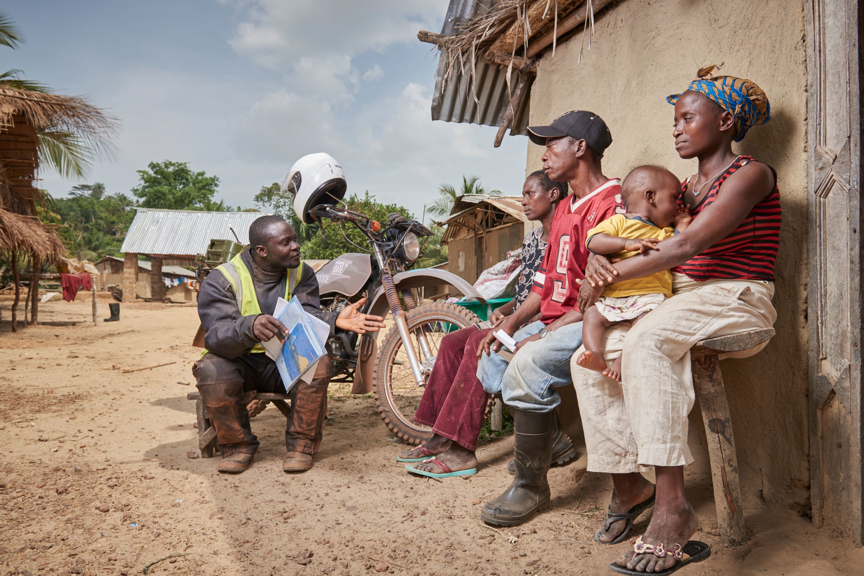 Delivering outreach health care in Kapatawee village Bong County, Liberia.