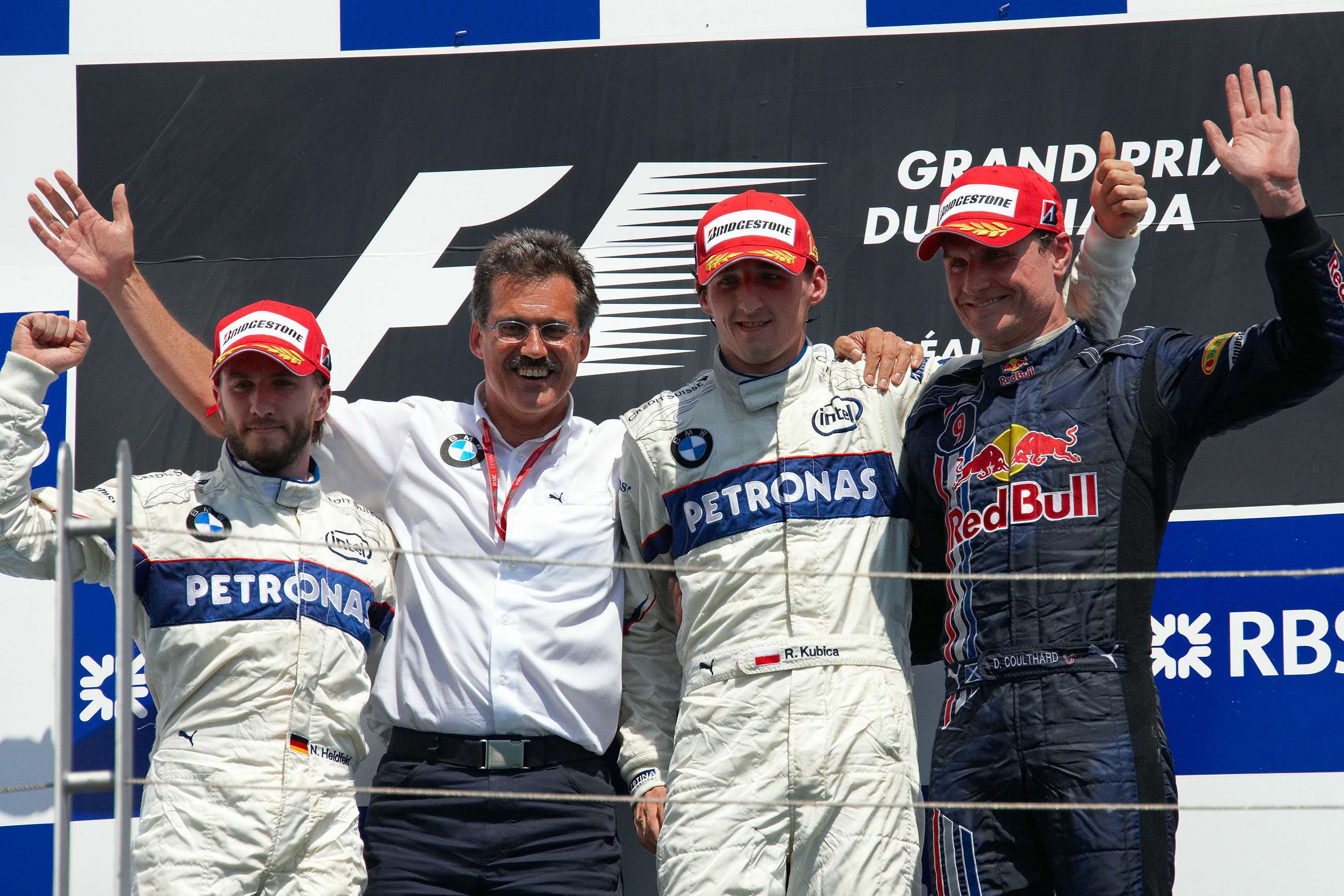 f1-2008-canada-robert-kubica-wing-nick-heidfeld-david-coulthard-podium-rainer-schlegelmilch-motorsport-images-goodwood-20092019.jpg