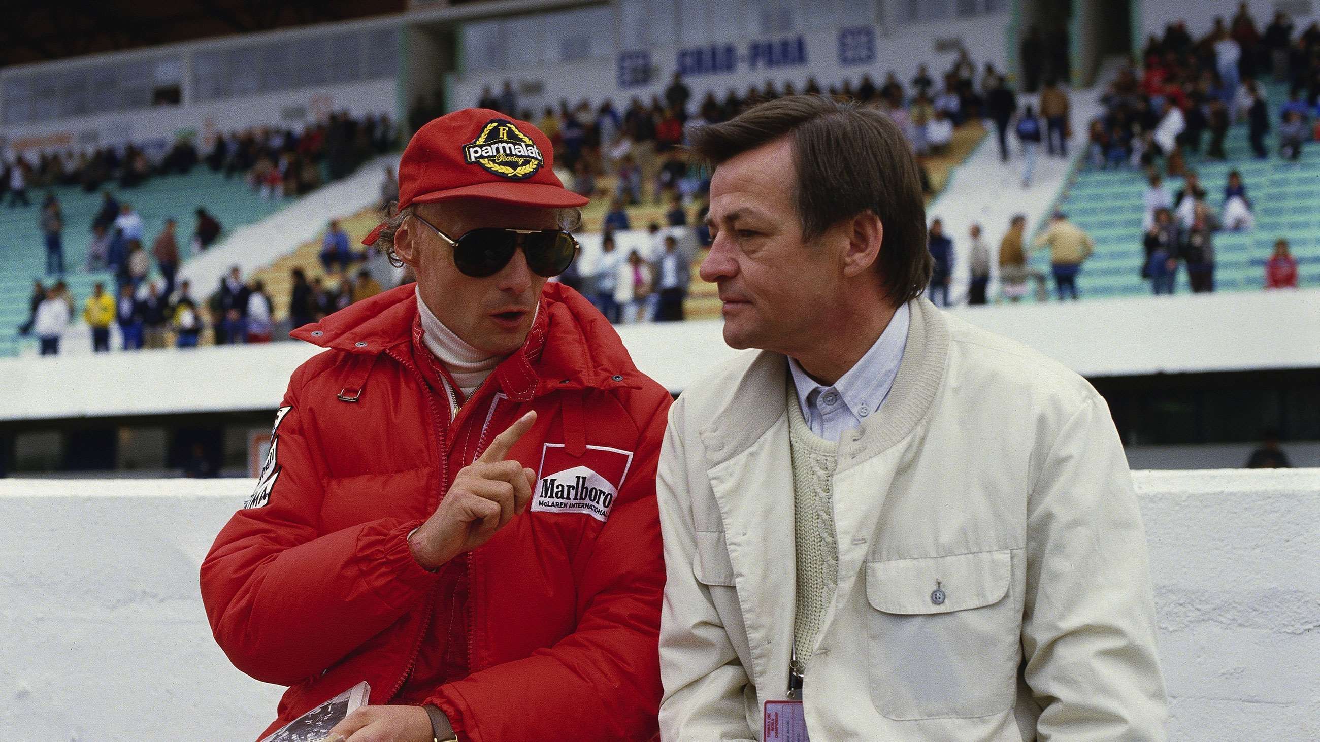 Mezger with McLaren's Niki Lauda, 1984.