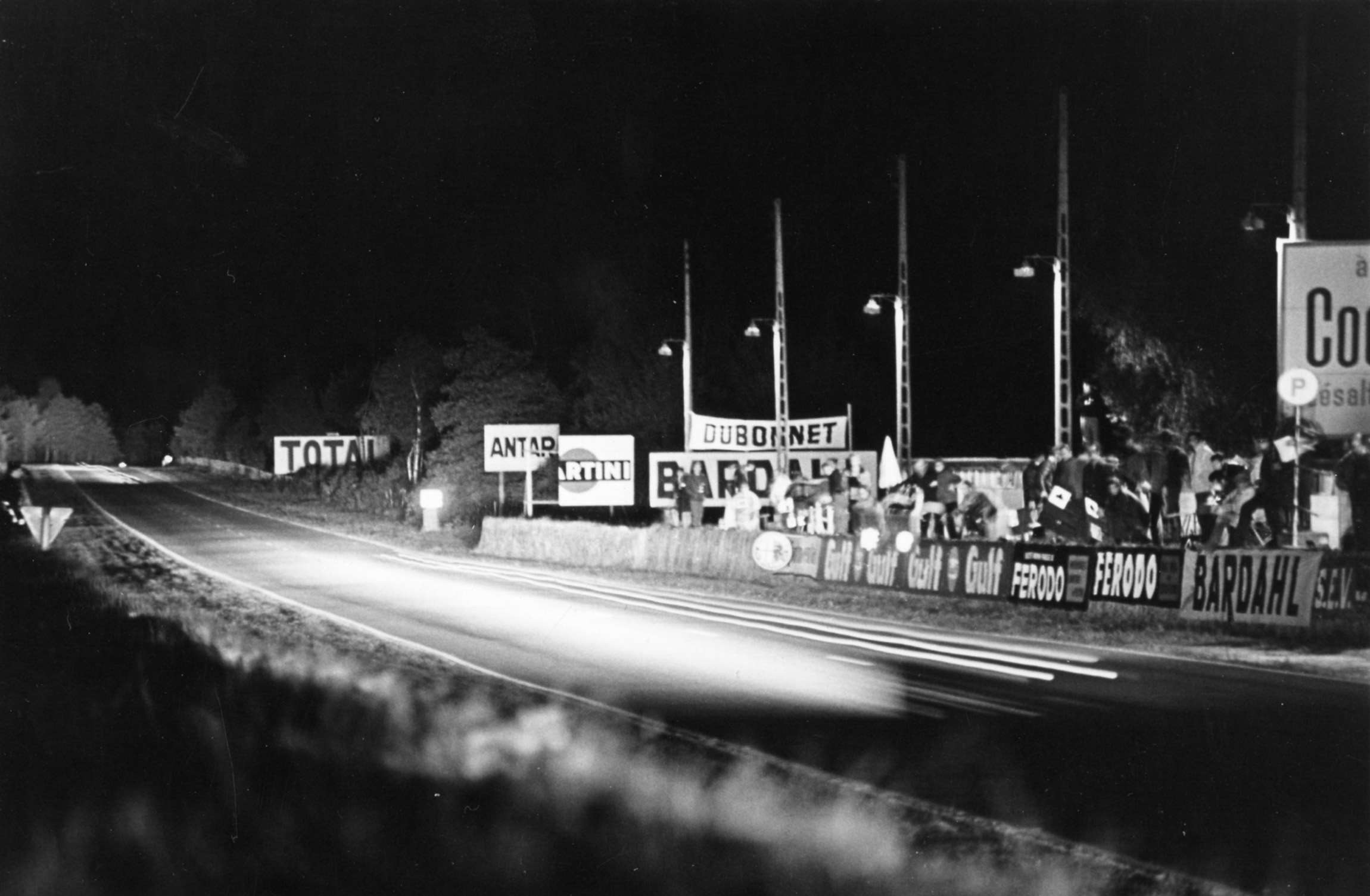 That so-evocative sight - racing headlights, trackside view at Le Mans – 1962