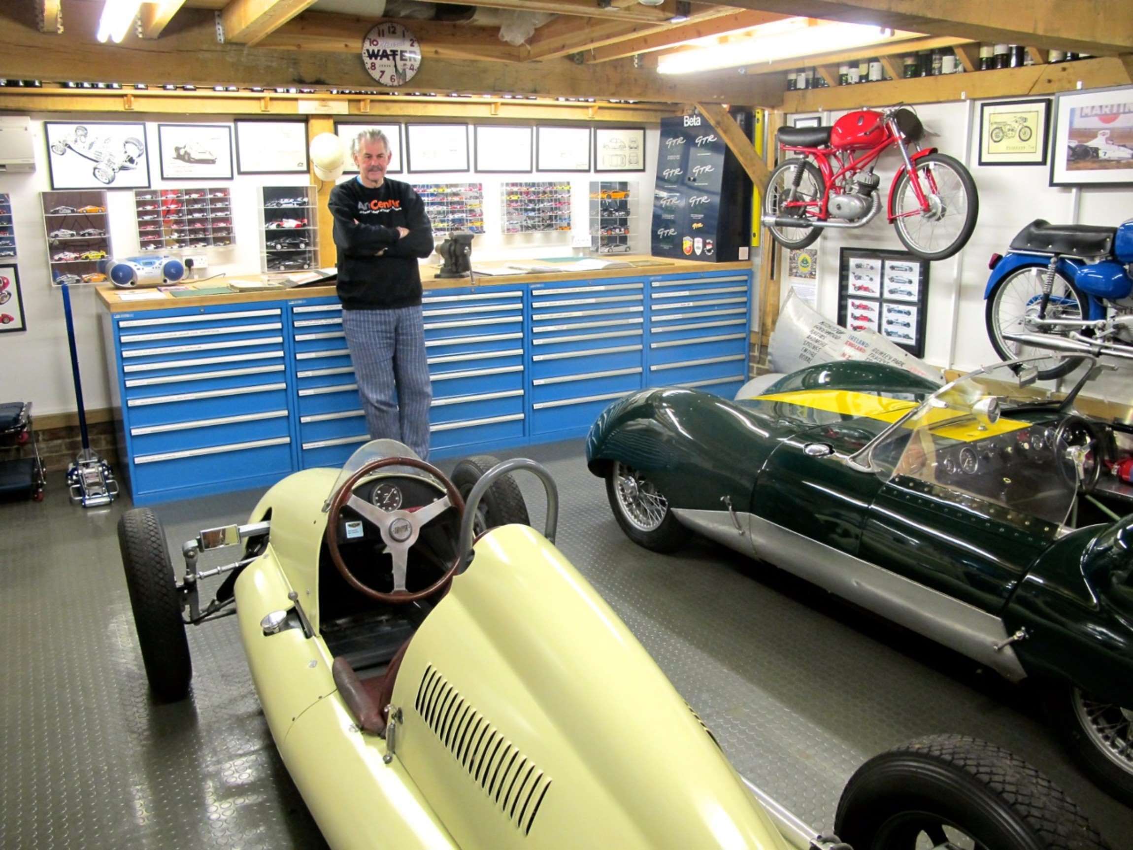 Professor Gordon Murray with his pride and joy Cooper (left foreground) - and enthusiast road transport Lotus-Ford 11 (right)