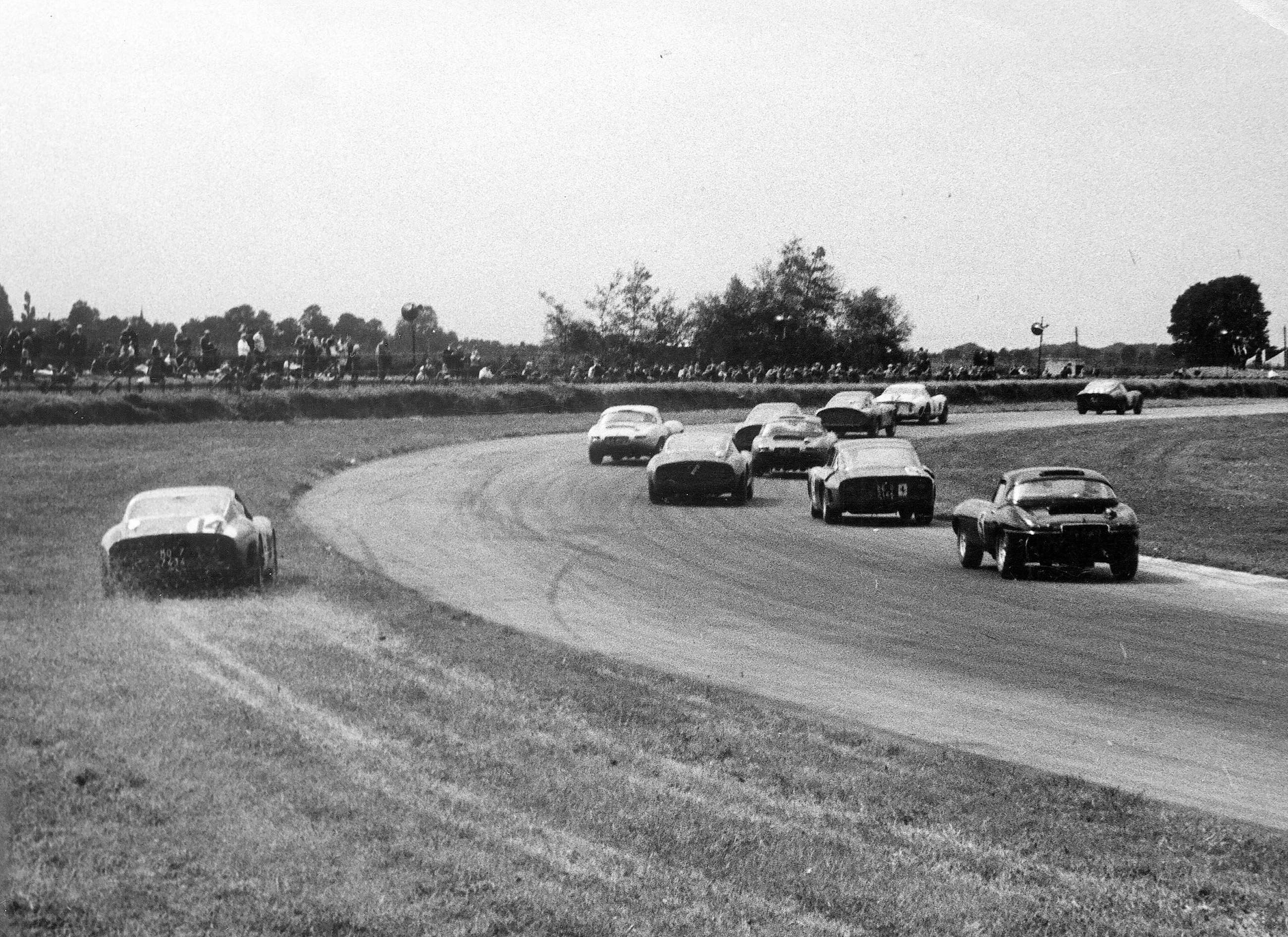 1 - Ooops - Tommy Hitchcock III off on the grass and heading for the Madgwick bank in Prince Zourab’s Ferrari 250GTO - 1963 Goodwood TT