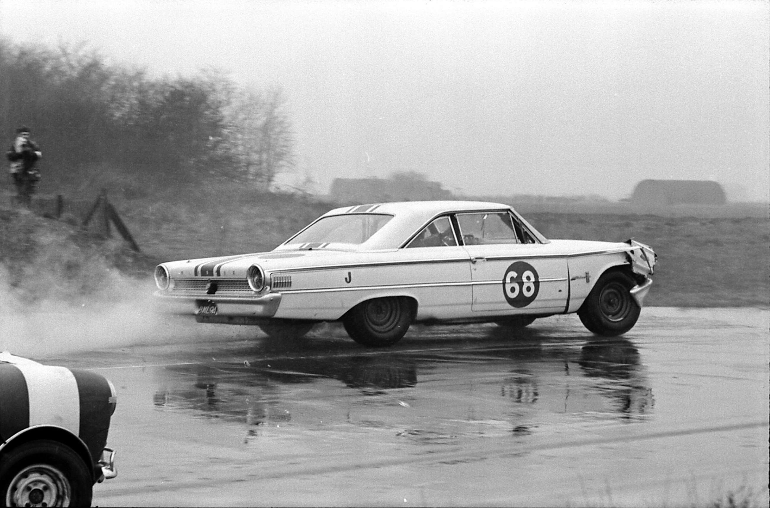 Whenever Jack finished in the great Galaxie he won - but occasionally out of luck as here at Snetterton with collision damage, having fallen over a Mini-Cooper…