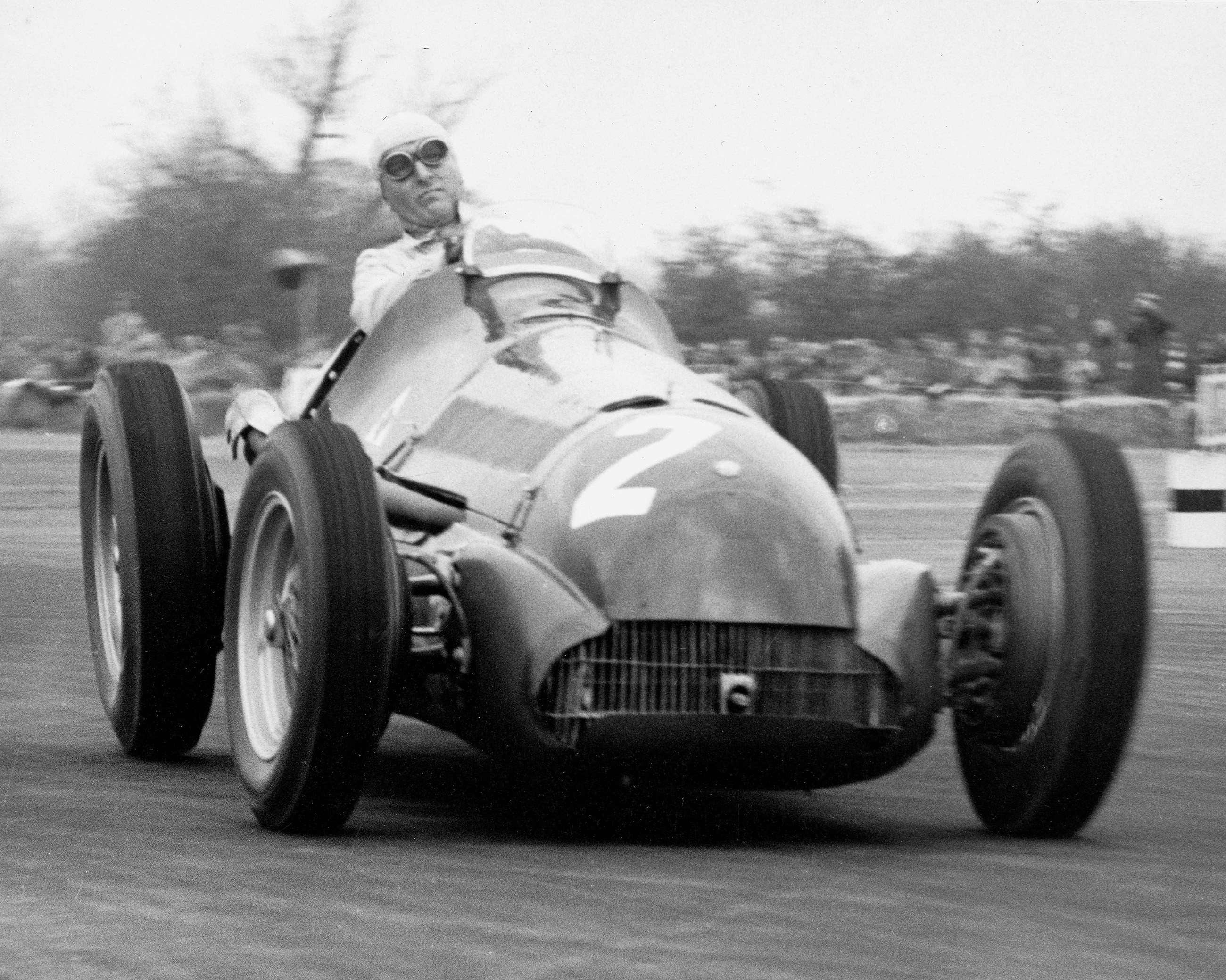 The great Farina asserting his mastery over the wayward Alfetta - during his 1950 World Champion season - every wheel at a different angle...