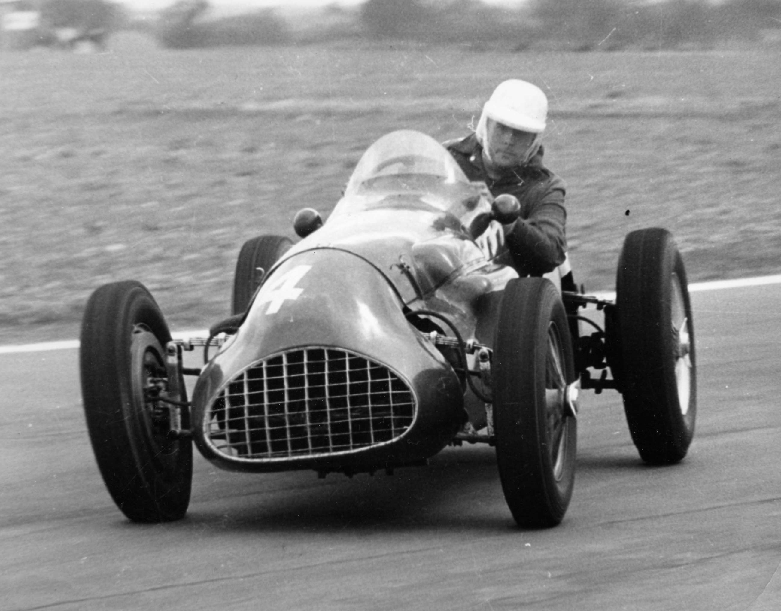 Australian debutant Jack Brabham having made his name in his ‘RedeX Special’ Cooper-Bristol in Australia made his UK bow at Goodwood Easter Monday 1955, in this Cooper-Alta.