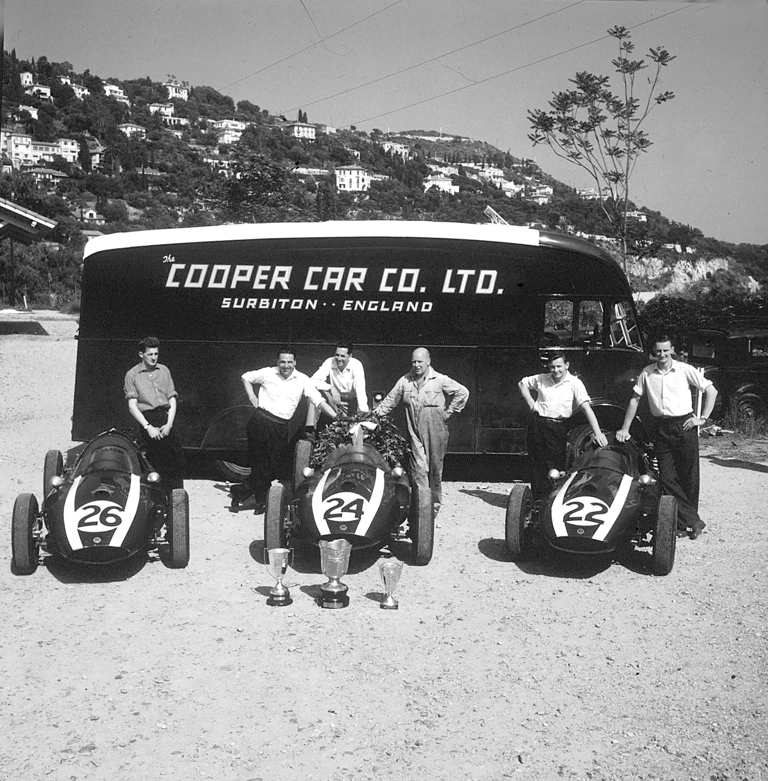 The 1959 Monaco GP-winning Cooper team. Left to right, Mechanic ’Noddy’ Grohman with Masten Gregory’s Cooper, John Cooper, winning driver Jack Brabham, chief mechanic Reg James, Bruce McLaren and Kiwi friend Phil Kerr.