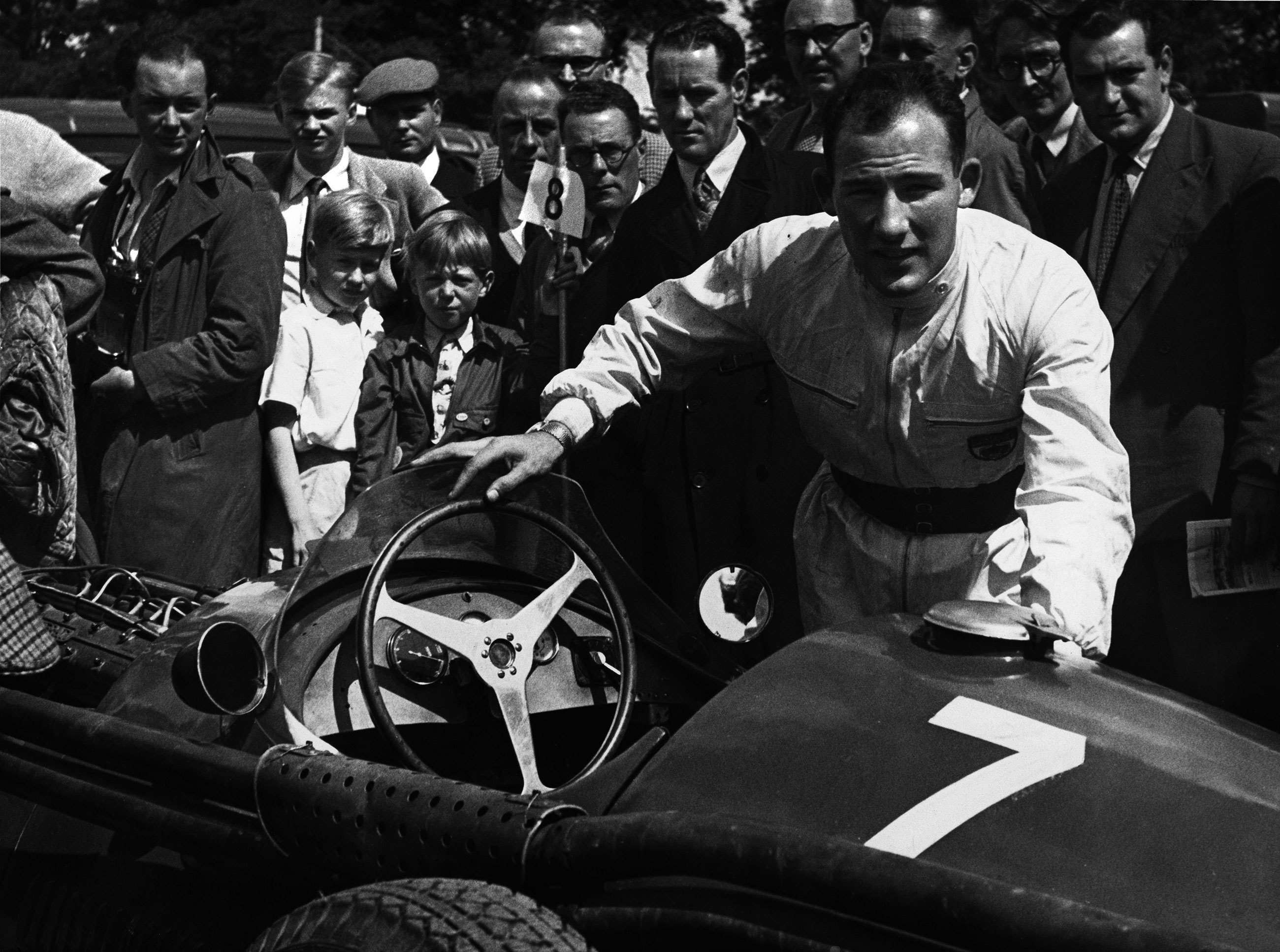 Moss with his Maserati 250F having won the Oulton Park Gold Cup, 1955. The car had been delivered from Italy that morning... 