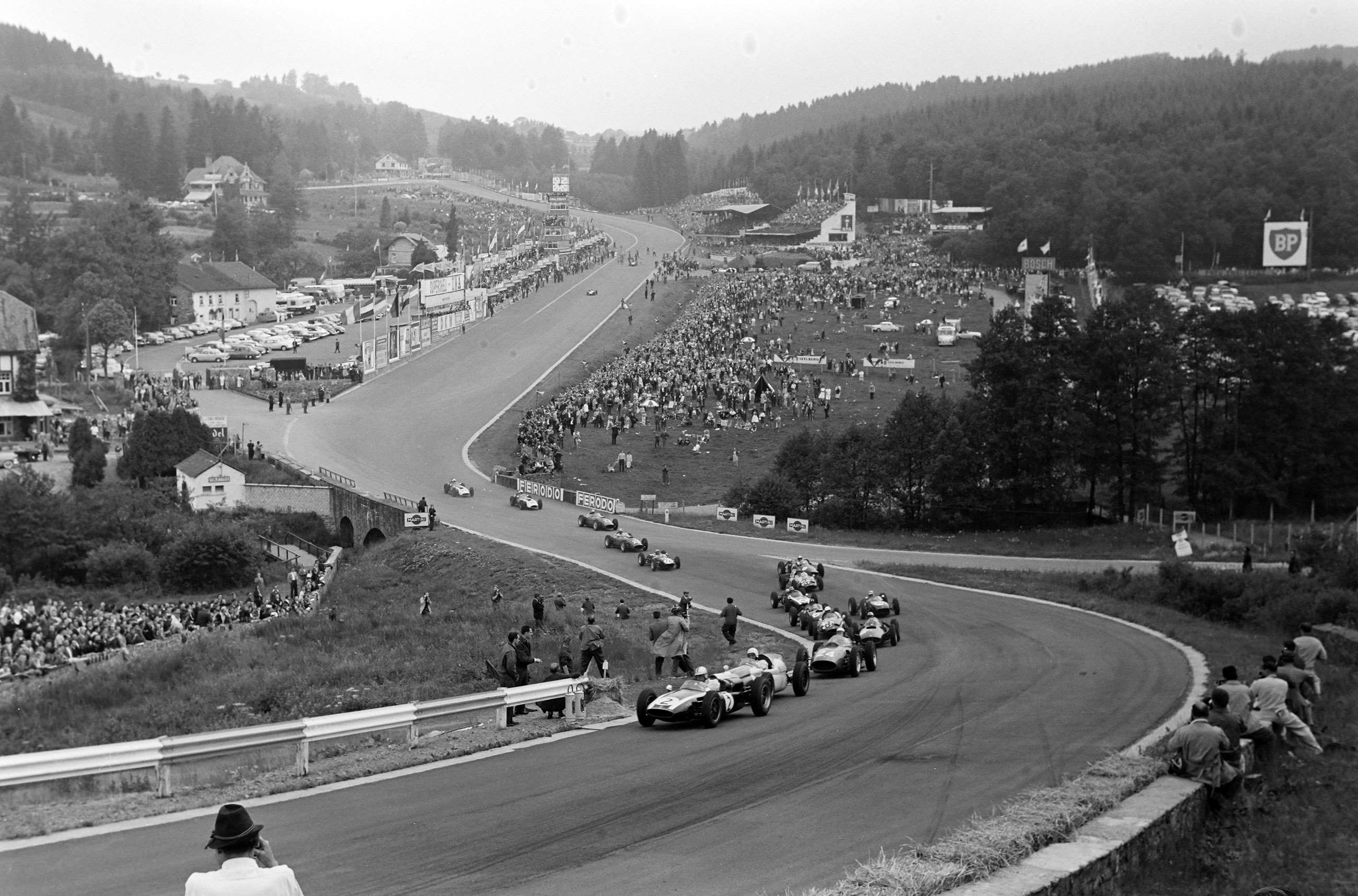 The start of the 1960 Belgian Grand prix at Spa, with Jack Brabham leading in his Cooper T53 Climax. 