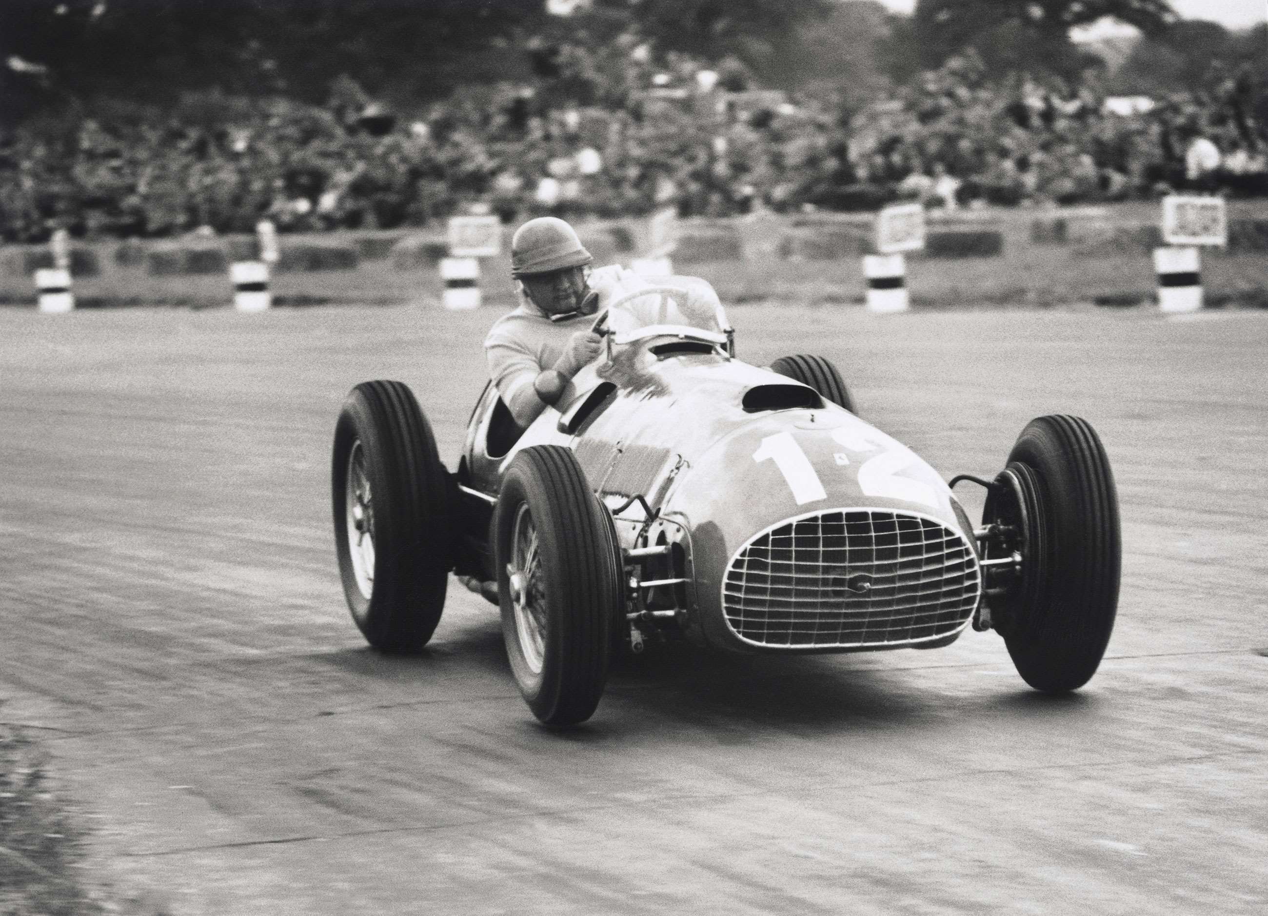 González on his way to Ferrari's maiden Formula 1 victory. 