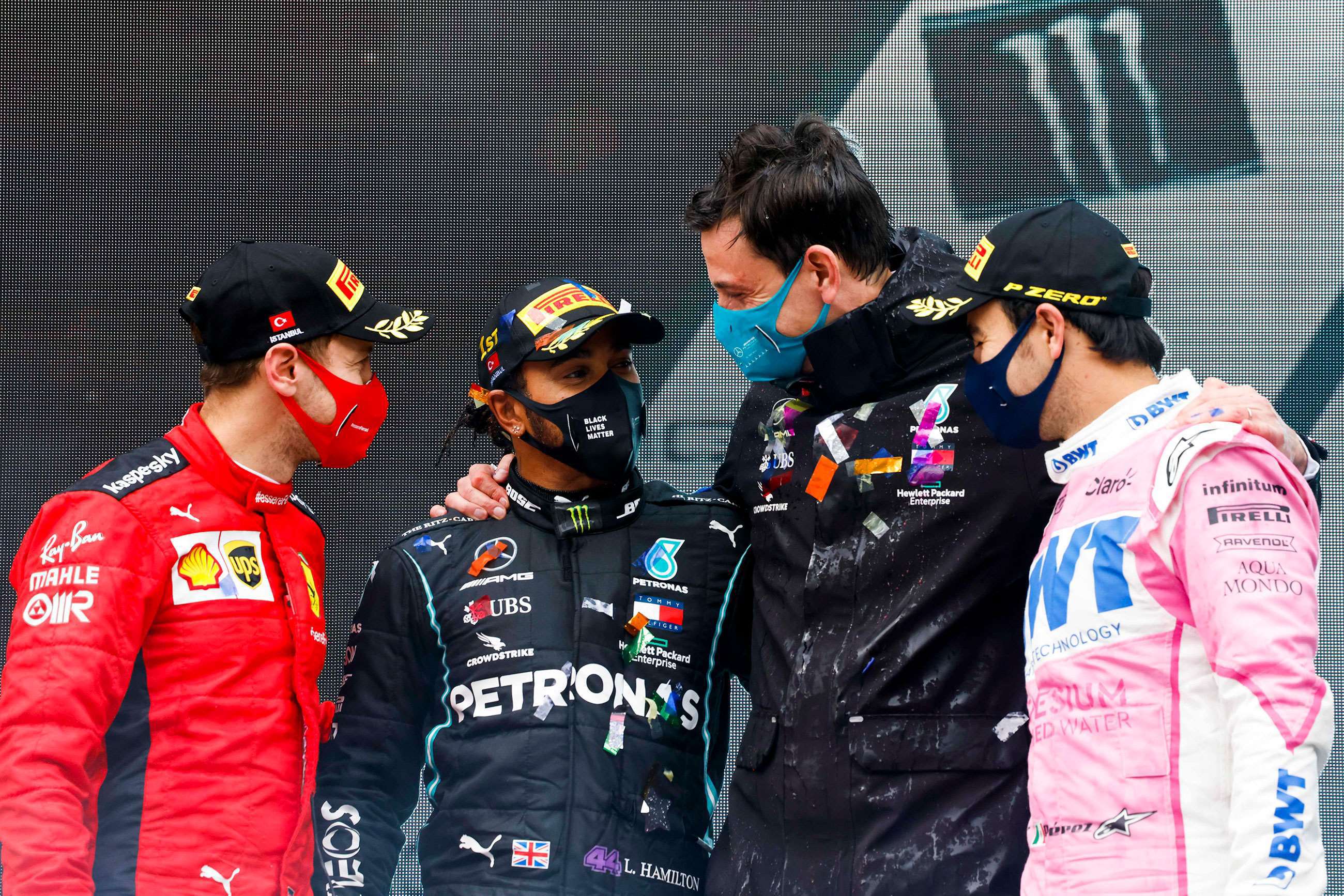 f1-2020-turkey-podium-sebastian-vettel-lewis-hamilton-toto-wolff-sergio-perez-glenn-dunbar-mi-goodwood-16112020.jpg