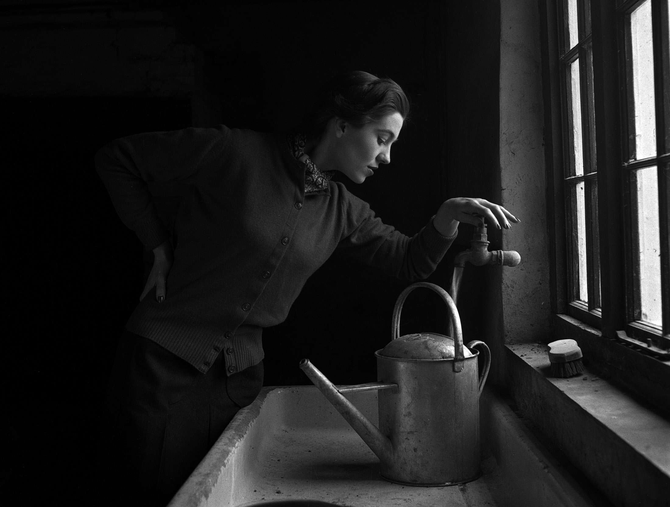 Model Filling Watering Can by Lee Miller.