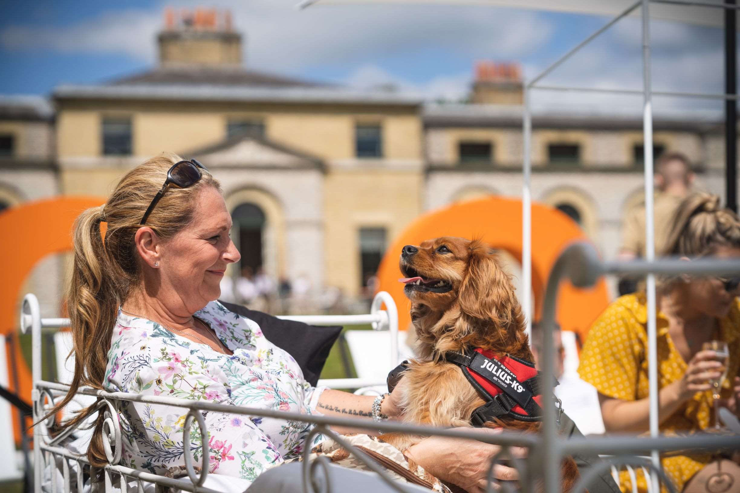 lady-sat-with-dog-the-kennels-goodwoof.jpg