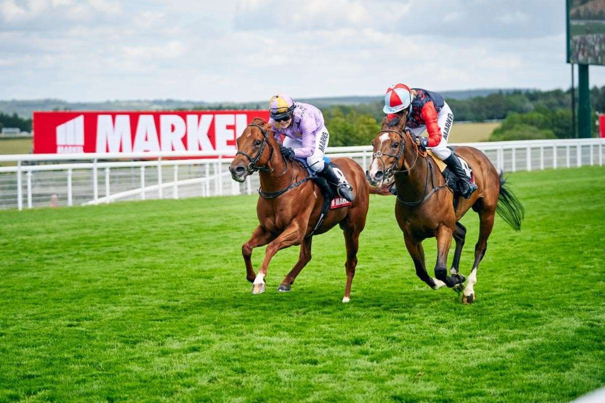 Thea Gosden-Hood (far side) and Candida Crawford dead-head in Magnolia Cup presented by Markel 