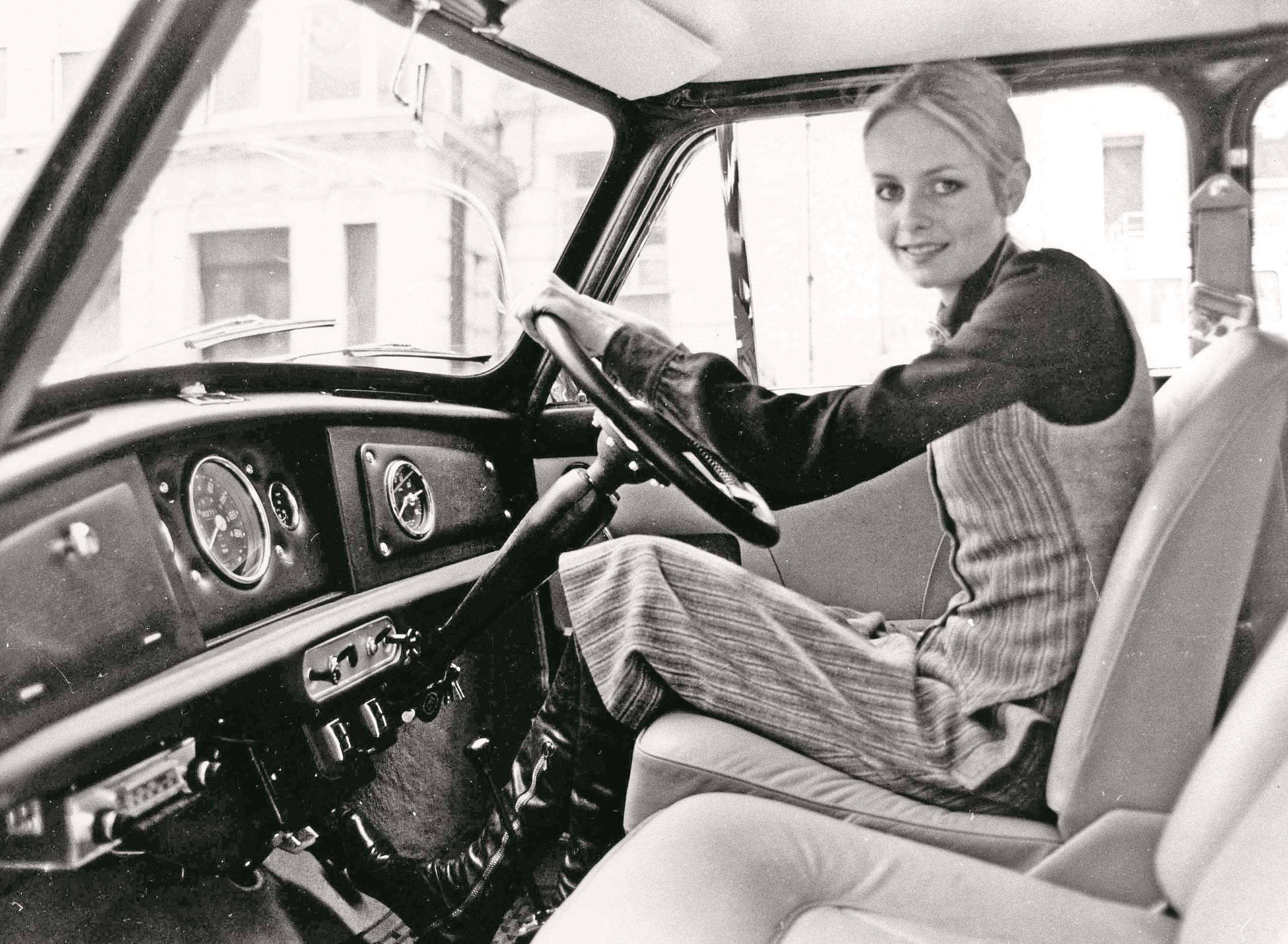 Model Twiggy was synonymous for many with the Swinging Sixties. Here she is photographed in 1968 at the age of 19 at the wheel of her Mini, in which – as was the case for so many young Brits of that era – she had just passed her driving test. 